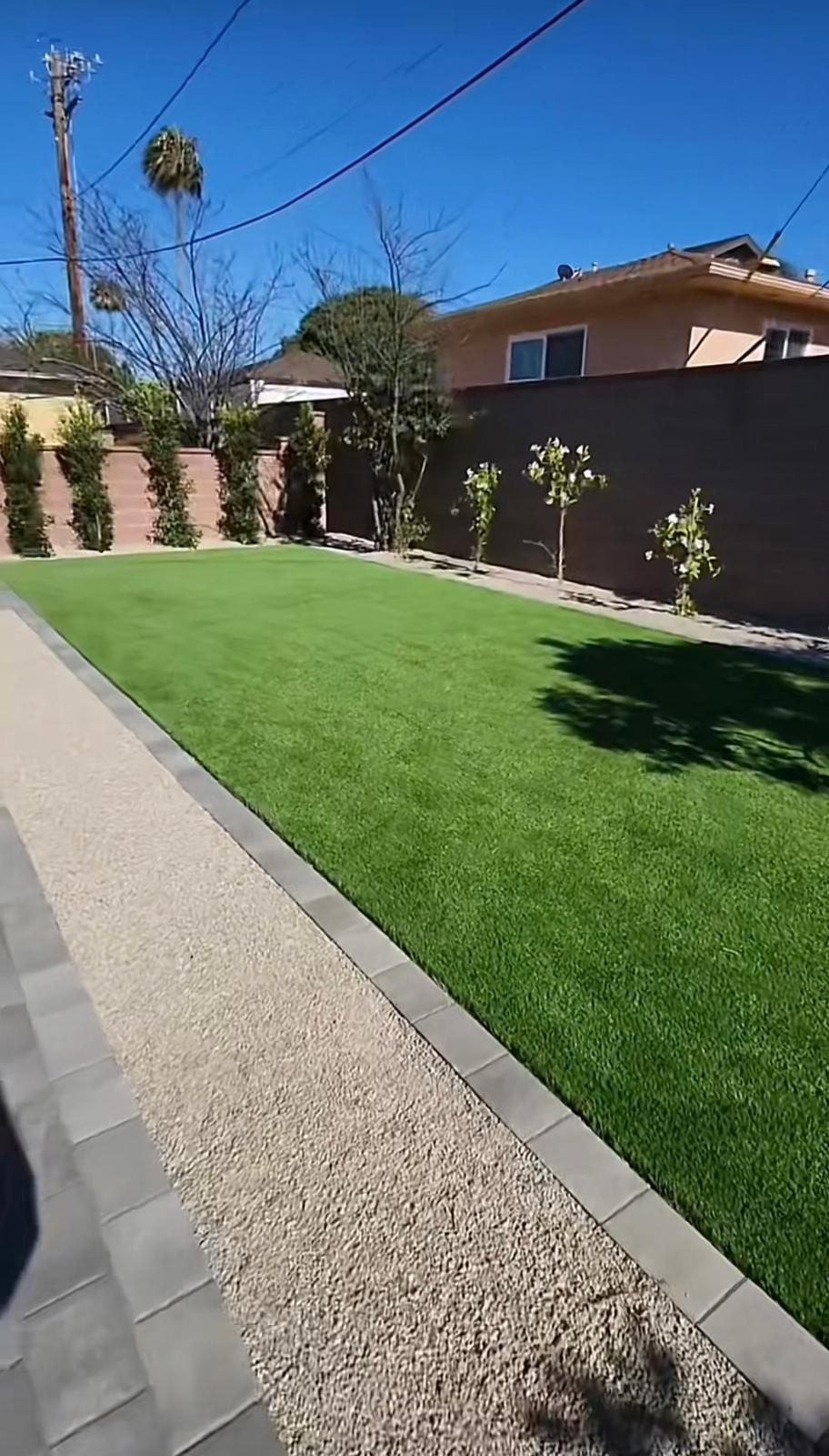 Sod Backyard with Gravel Path